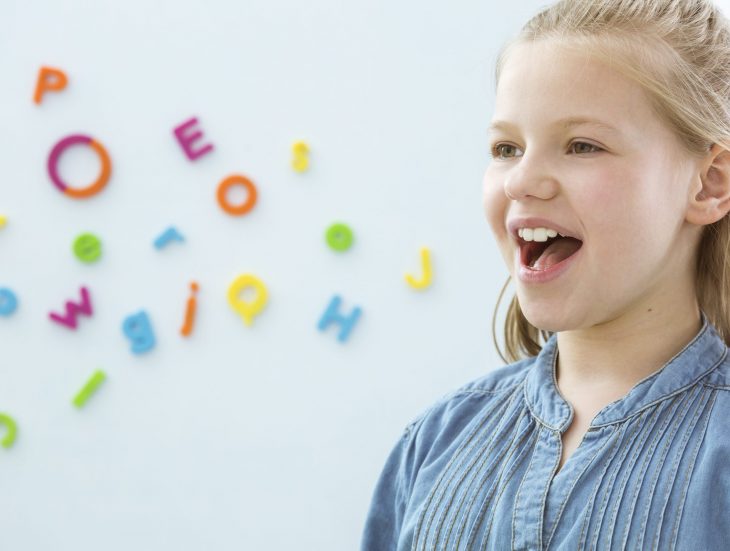 Girl in speech therapy office